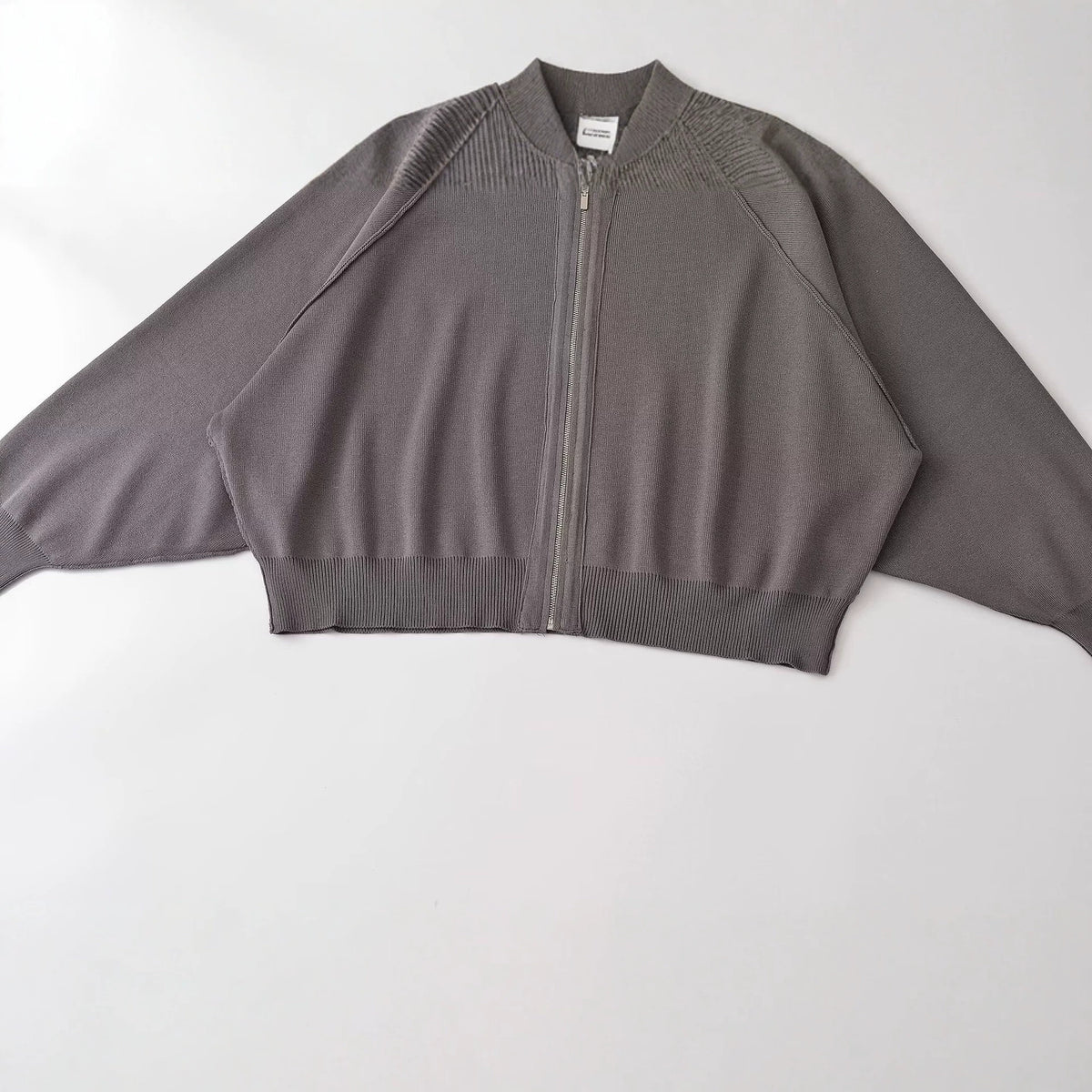 Zipper round neck long sleeved knitted sweater jacket